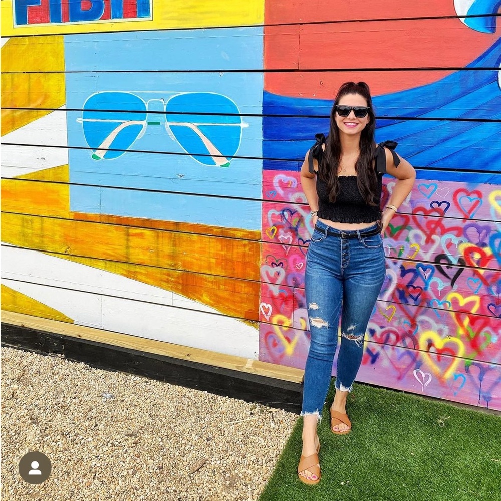 High waisted ripped straight leg jeans.